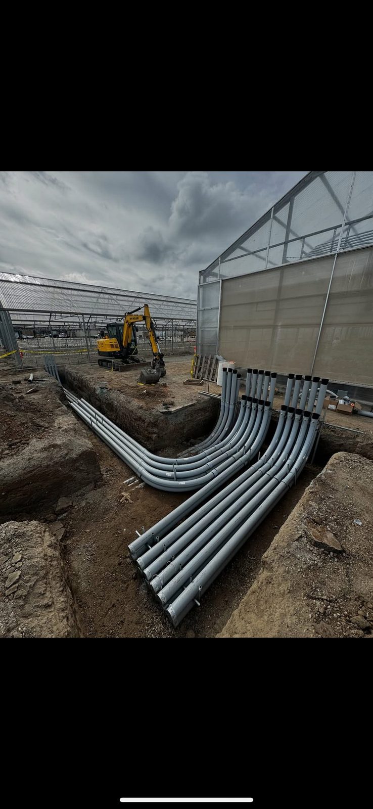 Large-scale underground conduit installation at commercial facility